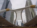 Iconic curved design pedestrian bridge at Chong Nonsi BTS skytrain station.